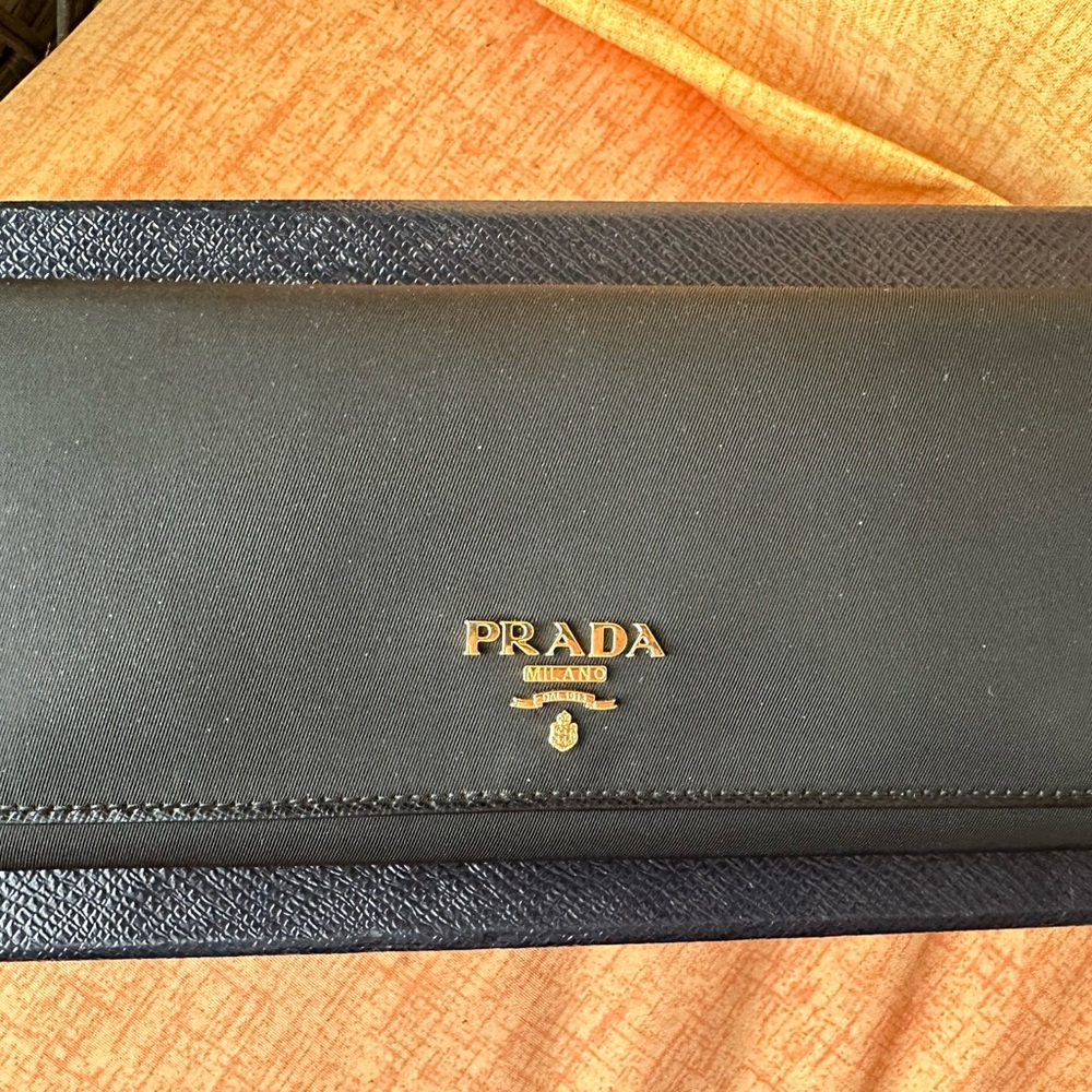 Prada triangle flap Tessuto nylon Saffiano black continental wallet